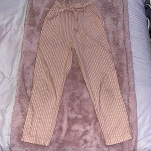 Light pink pants with white stripes